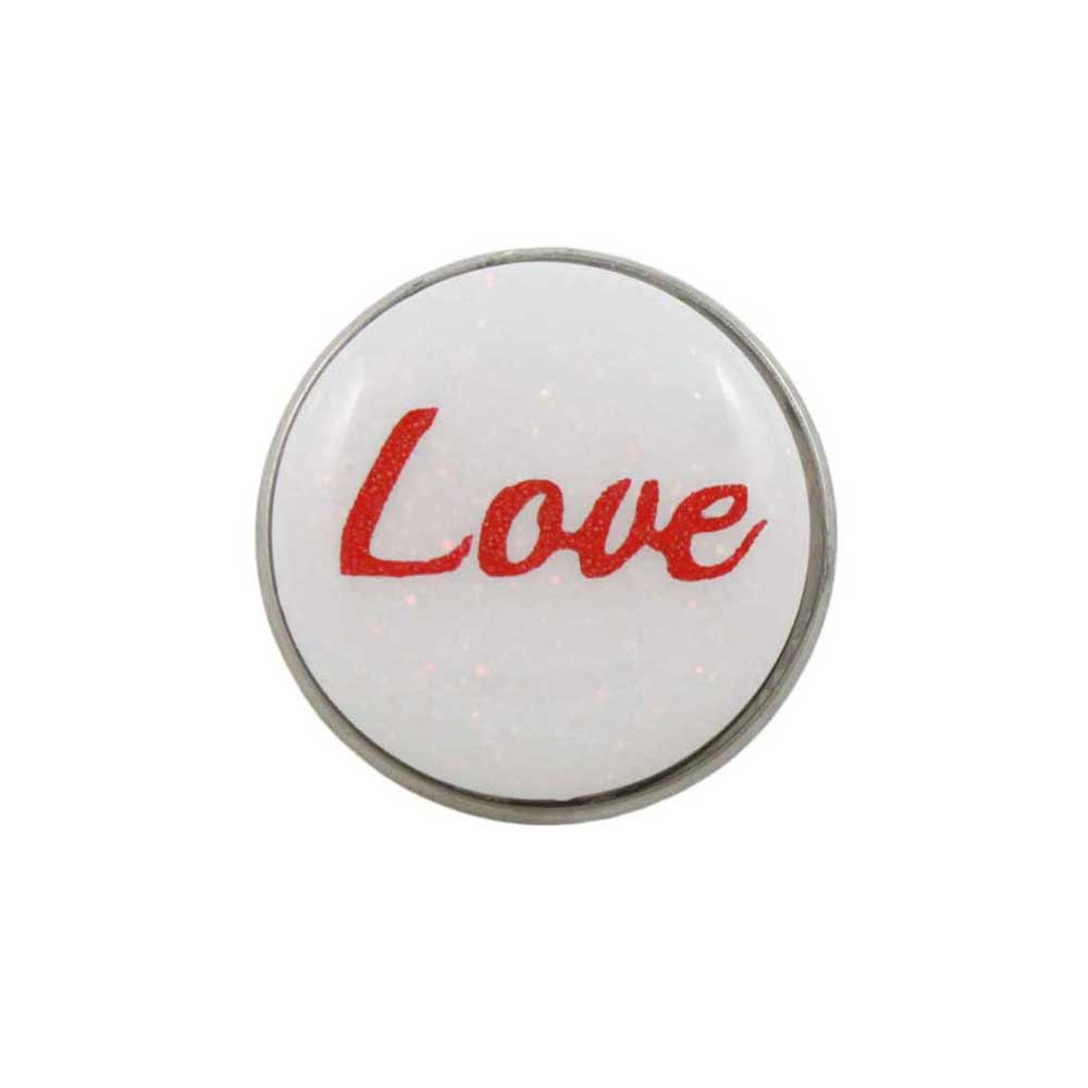 Round white object with 'Love' in red text on a white background