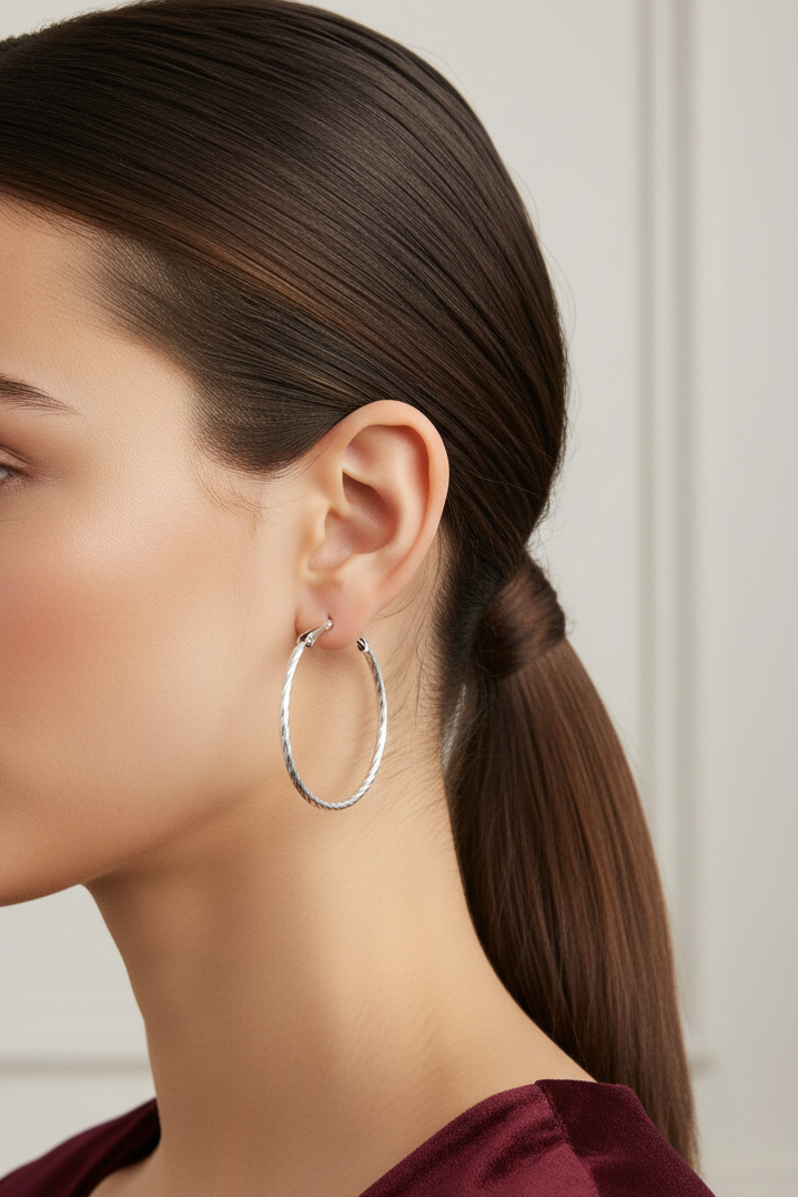 Model wearing silver medium 1.50" lightweight hoop pierced earring - Lilylin Designs