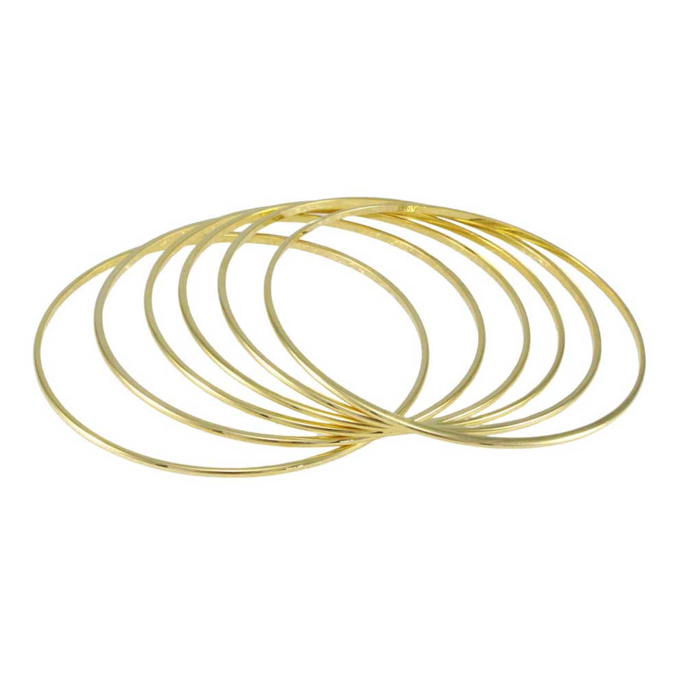 6 Gold Stackable Skinny Slip On Bangles fanned out on a white background - Lilylin Designs