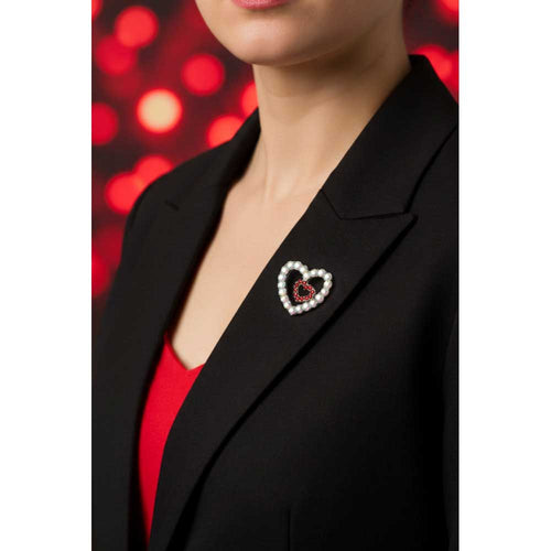 Model wearing AB and red crystal hearts brooch pin on a black jacket with a red top - Lilylin Designs