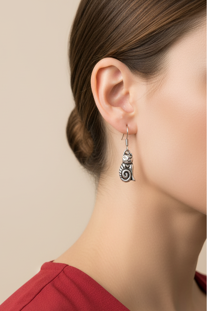 Model wearing antiqued silver-tone cat dangle earring - Lilylin Designs