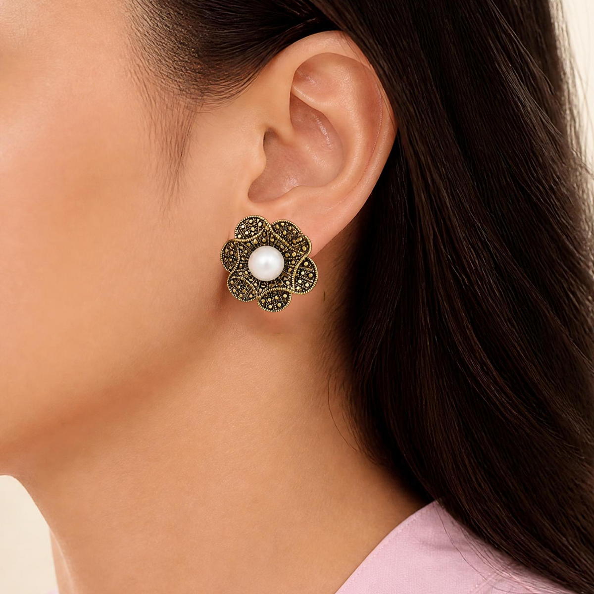 Model wearing antique gold - tone flower with white pearl pierced earring - Lilylin Designs