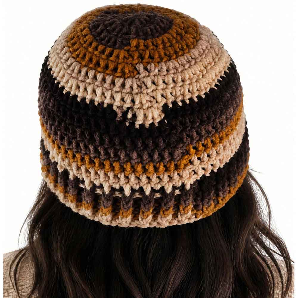 Back view of view of model wearing brown, tan, and dark brown crochet beanie hat 