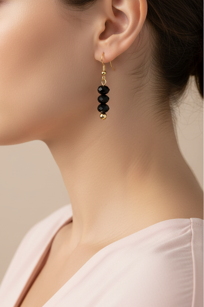 Model wearing black faceted bead earring - Lilylin Designs