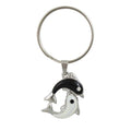Keychain with black and white dolphins on a white background - Lilylin Designs