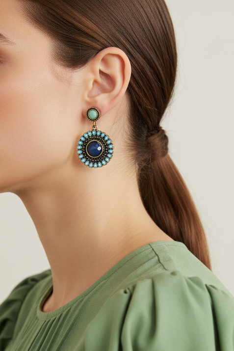 Model wearing blue dangle disc earring - Lilylin Designs