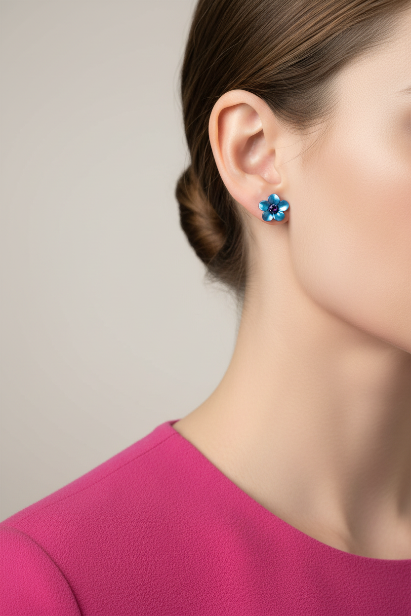 Model wearing dark blue enamel daisy earring with dark blue crystal center - Lilylin Designs