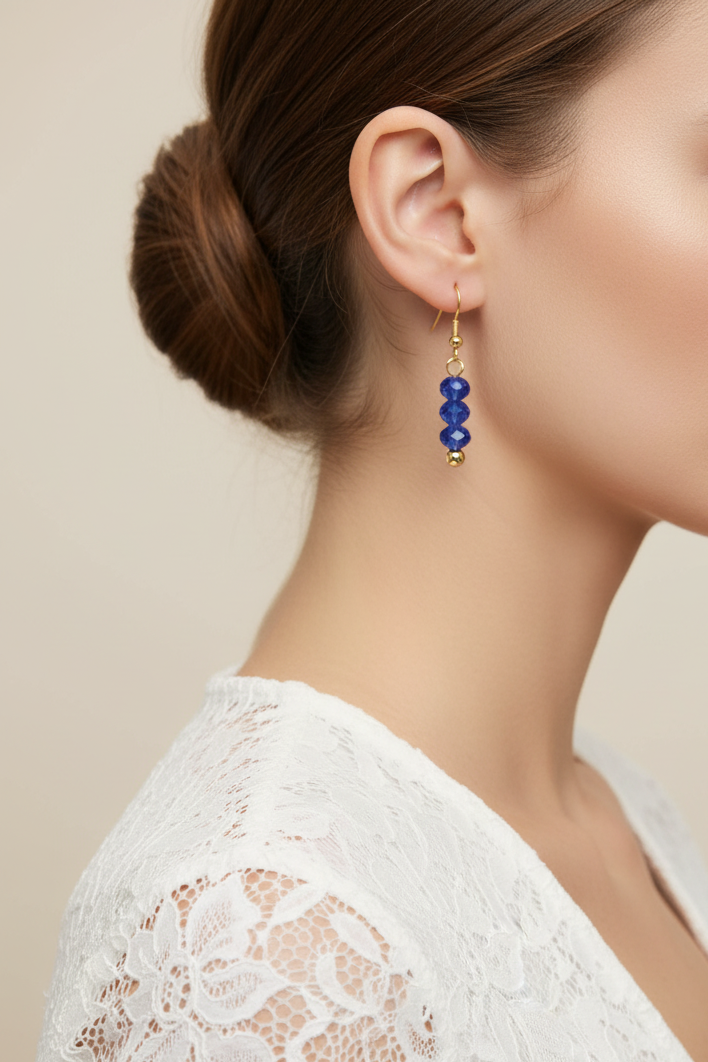 Model wearing blue faceted bead earring - Lilylin Designs