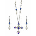 Silver-tone cross necklace and matching drop earrings featuring blue faceted beads, clear rhinestones, and white faux pearls on a plain white background. Lilylin Designs