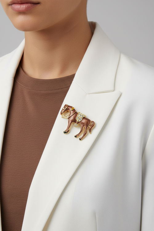 Model wearing brown enamel horse pin on a white jacket with a brown t-shirt - Lilylin Designs