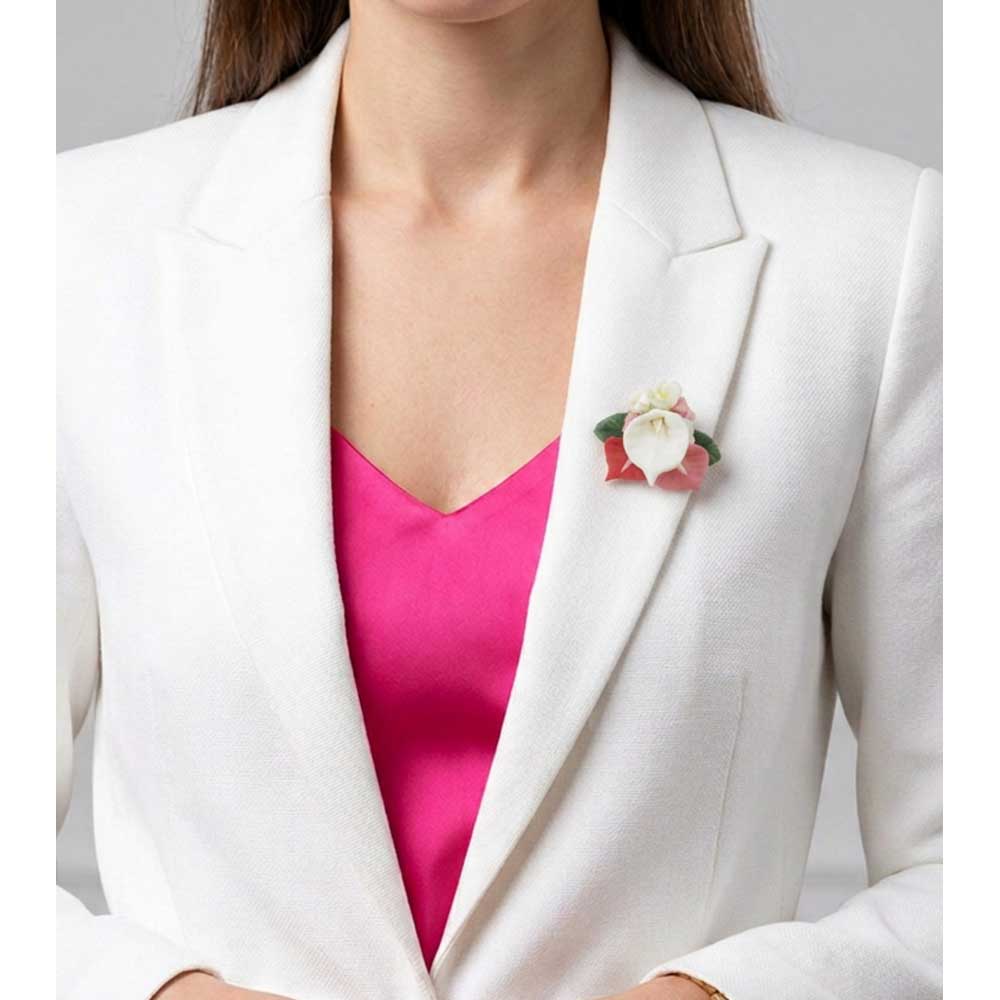 Clay Bouquet of Lilies and Daisies Flower Brooch Pin shown on model with a white jacket and hot pink top - Lilylin Designs