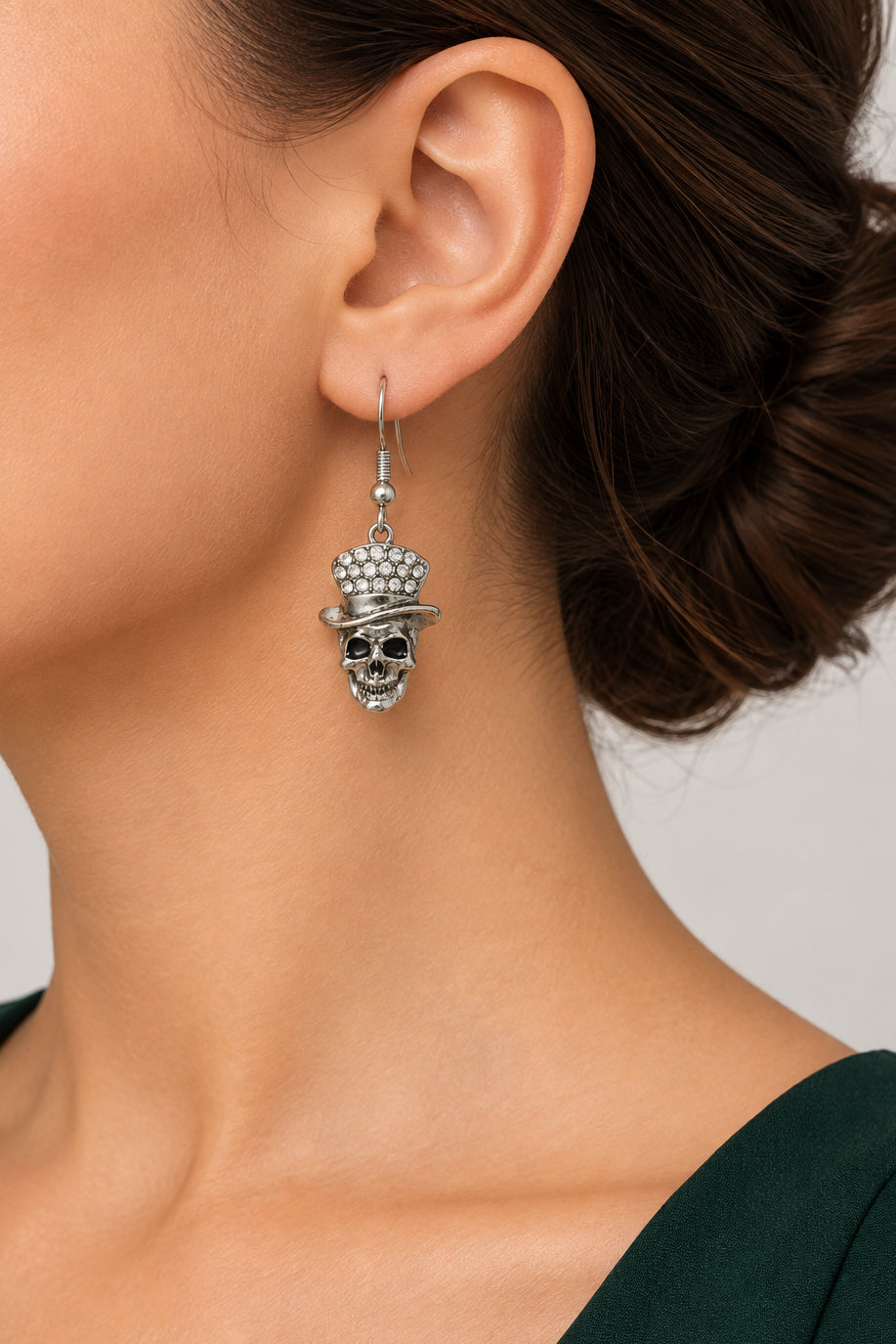 Model wearing antique skull with crystal hat dangling earring - Lilylin Designs