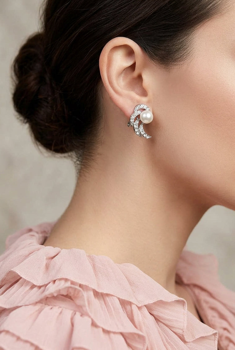 Model wearing crystal waves with white imitation pearl clip earring - Lilylin Designs