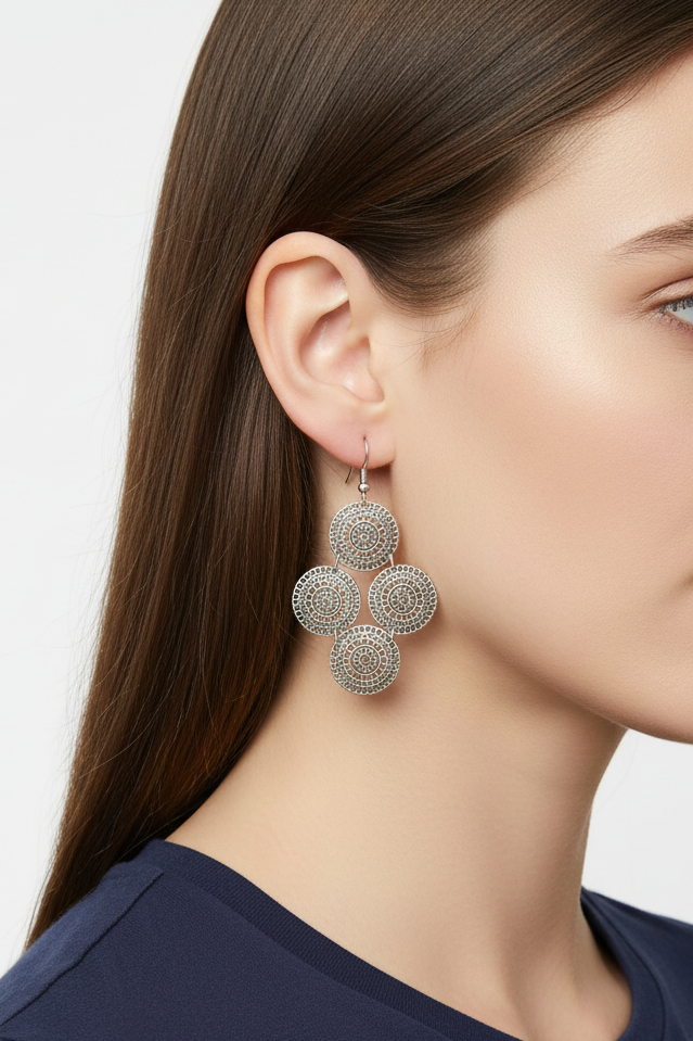 Model wearing silver-tone 4 filigree disc dangle earring  - Lilylin Designs