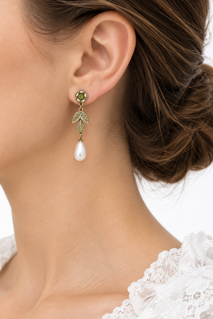 Model wearing gold flower with Dangling white pearl pierced earring - Lilylin Designs