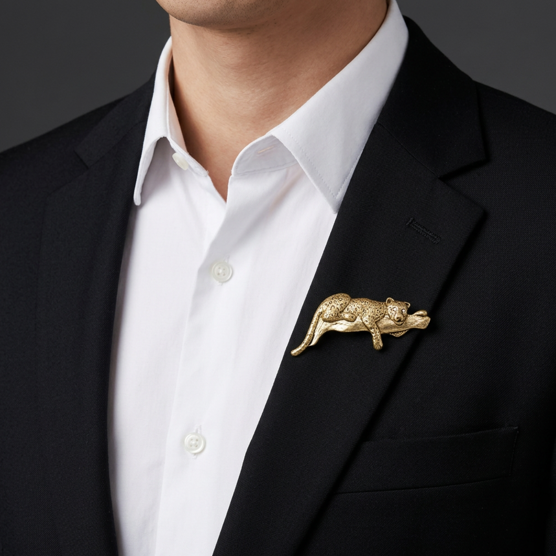 Cheetah Resting on Tree Branch Brooch Pin on model with a black jacket - Lilylin Designs