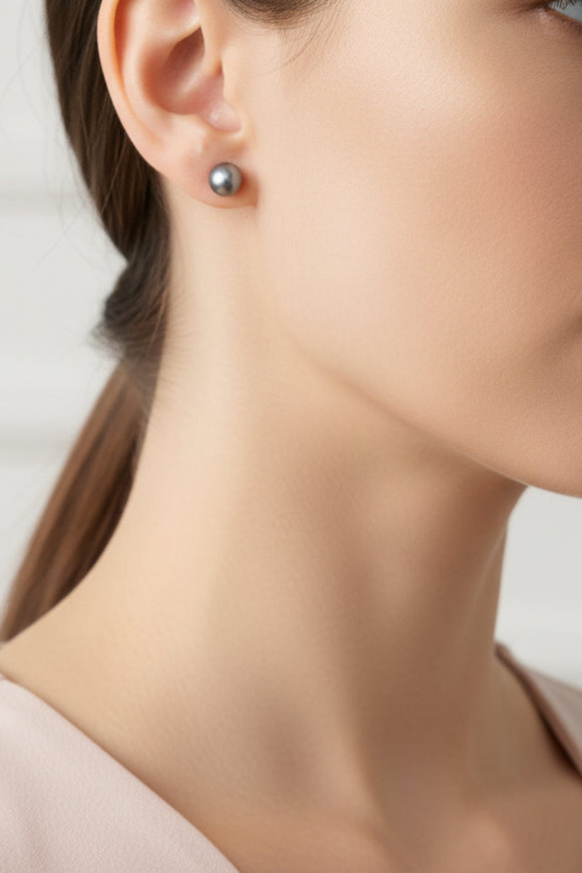 Model wearing gray pearl stud earring - Lilylin Designs