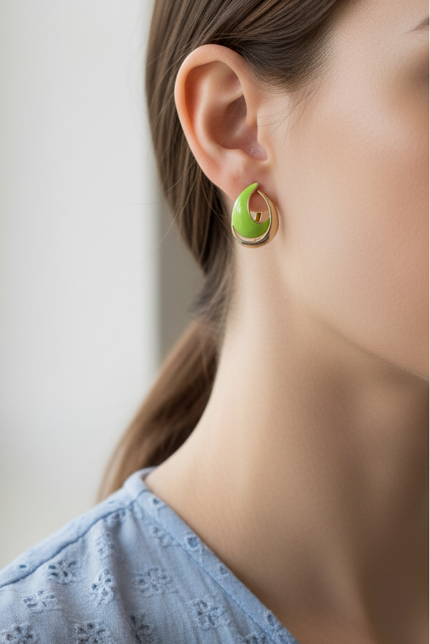 Model wearing green and gold open teardrop earring - Lilylin Designs