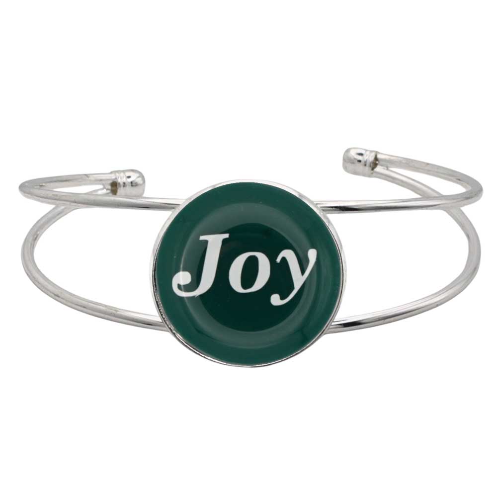 A silver-toned open cuff bangle bracelet featuring a round dark green disc with the word 'Joy' in white script, shown on a plain white background - Lilylin Designs