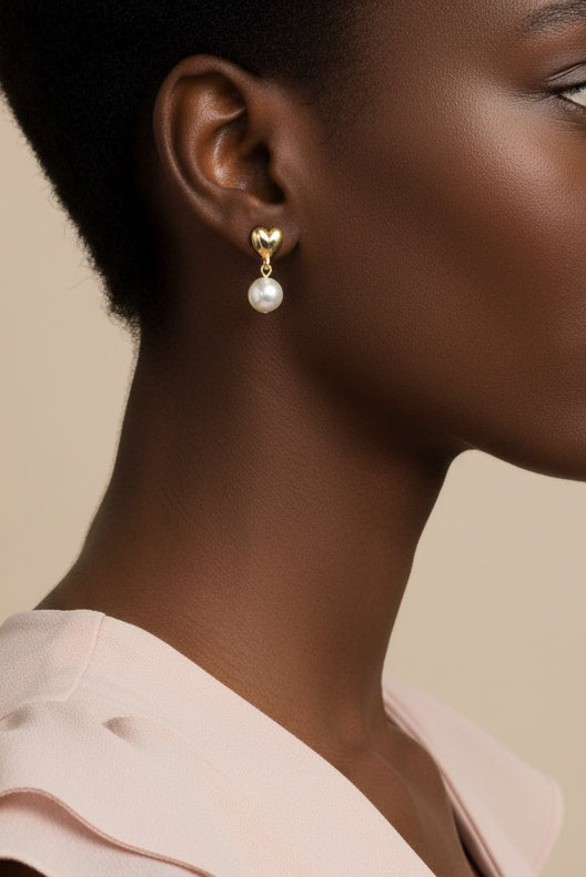 Model wearing gold heart with 8MM white pearl pierced earring - Lilylin Designs