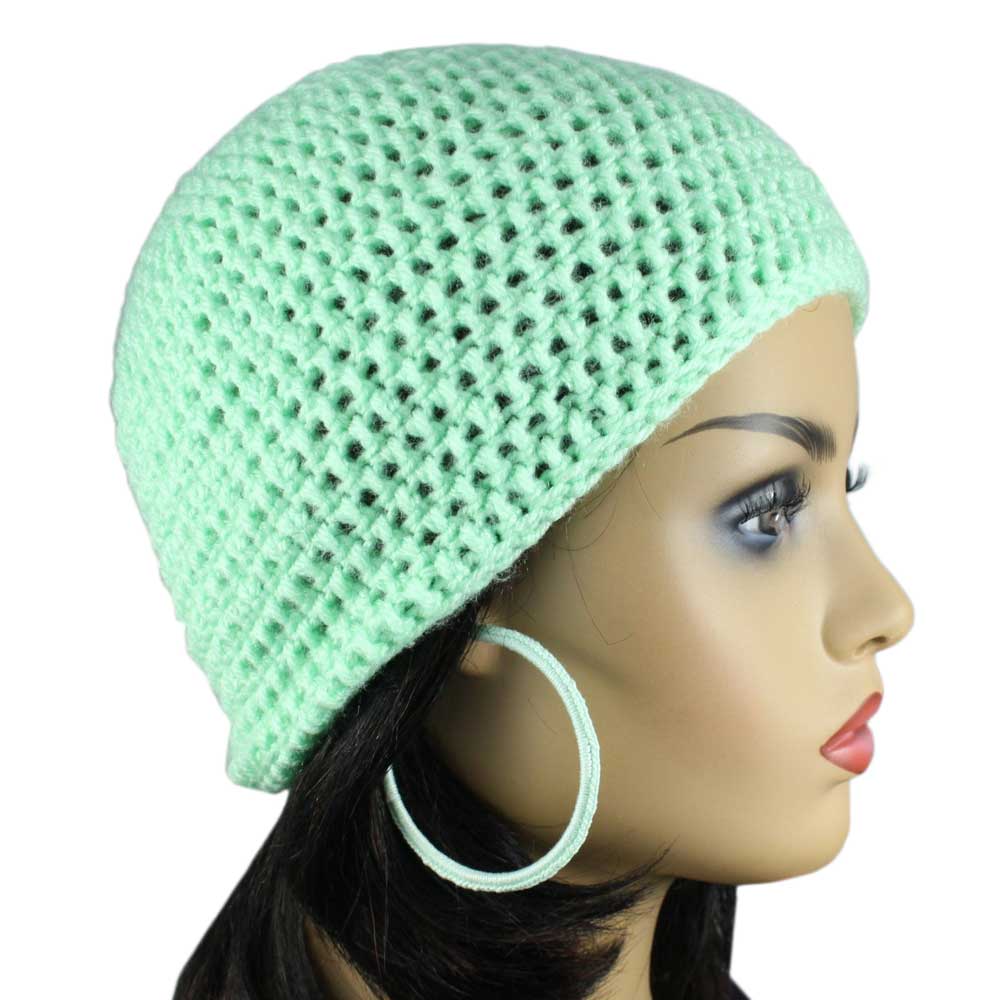 Model with Lilylin Designs Mint Green Medium/Large Crochet Beanie Hat and Earrings