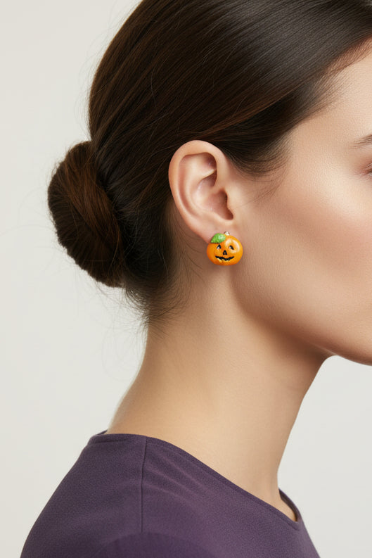 Model wearing orange Jack O Lantern pumpkin Halloween pierced earring - Lilylin Designs