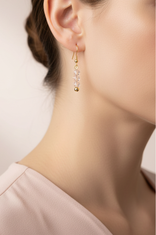 Model wearing light pink faceted bead earring - Lilylin Designs