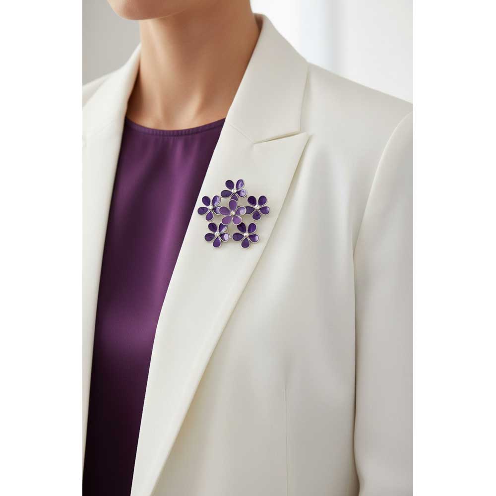 Model wearing 5 purple daisies brooch pin on a white jacket with a purple top - Lilylin Designs