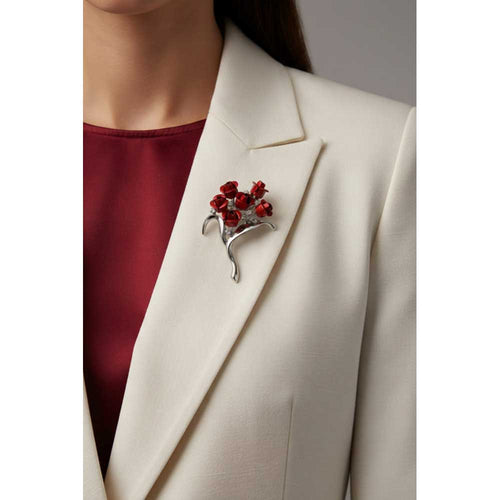 Model wearing 6 red roses bouquet brooch pin on a white jacket with a red blouse - Lilylin Designs