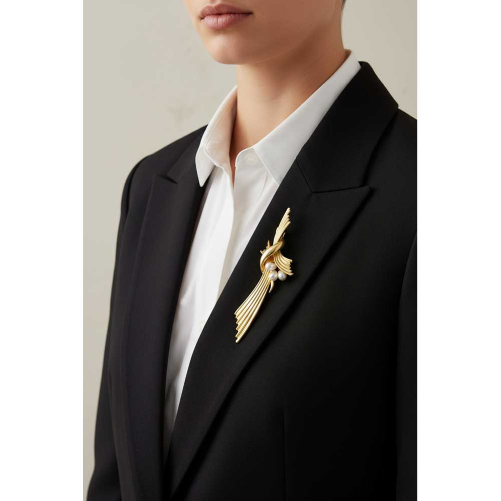 Model wearing Accordion pleats pearl pin brooch on a black jacket with a white shirt - Lilylin Designs
