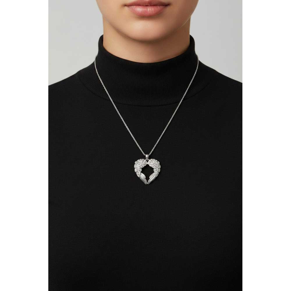 Model wearing Angel wings necklace with a black turtleneck - Lilylin Designs