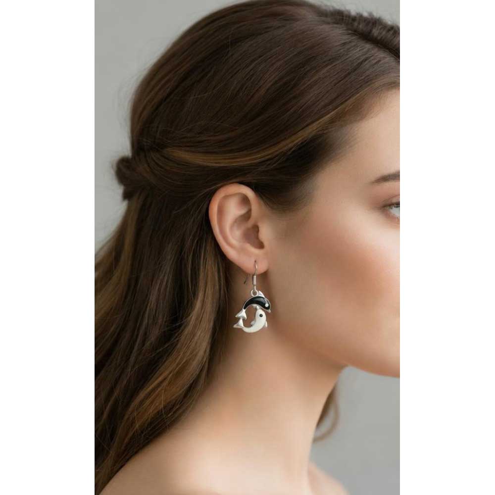 Model wearing Black and white dolphin earrings - Lilylin Designs