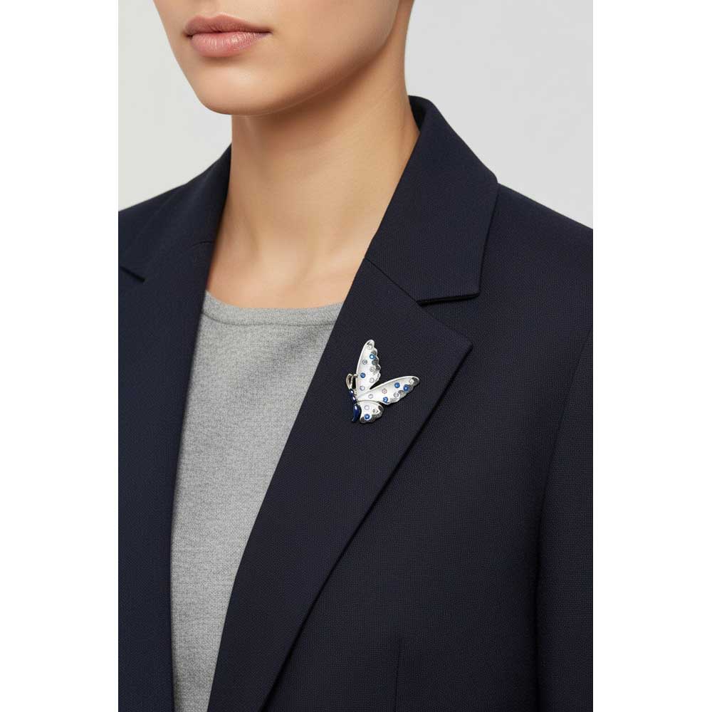 Model wearing Blue and gray butterfly lapel tac pin on a dark blue jacket with a gray shirt - Lilylin Designs