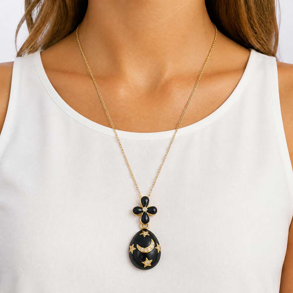 Model waring Blue celestial egg necklace with a white tank top - Lilylin Designs