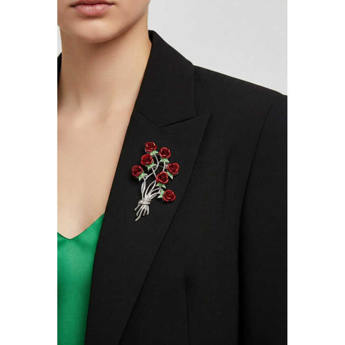 Model wearing Bouquet of 7 red roses brooch pin on a black jacket with a green top - Lilylin Designs