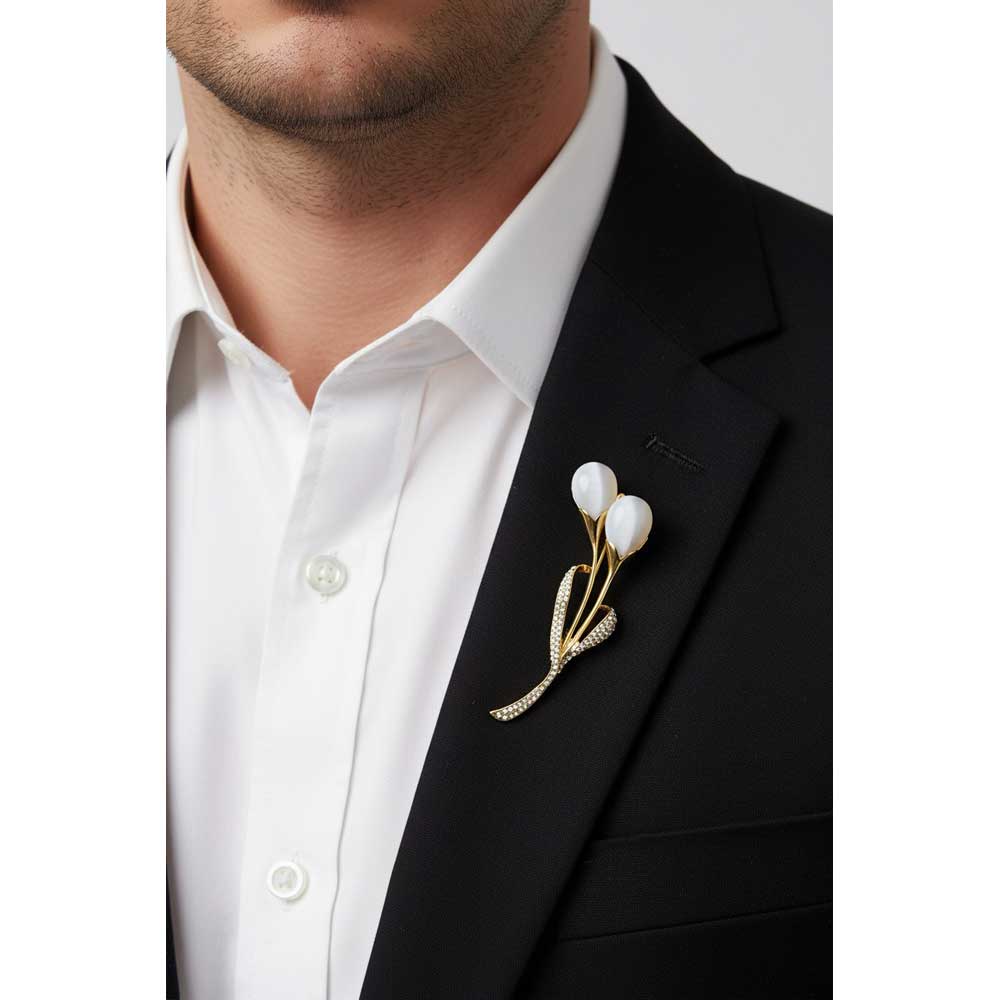 Model wearing Cats eye flower buds brooch pin on a black jacket with a white shirt - Lilylin Designs