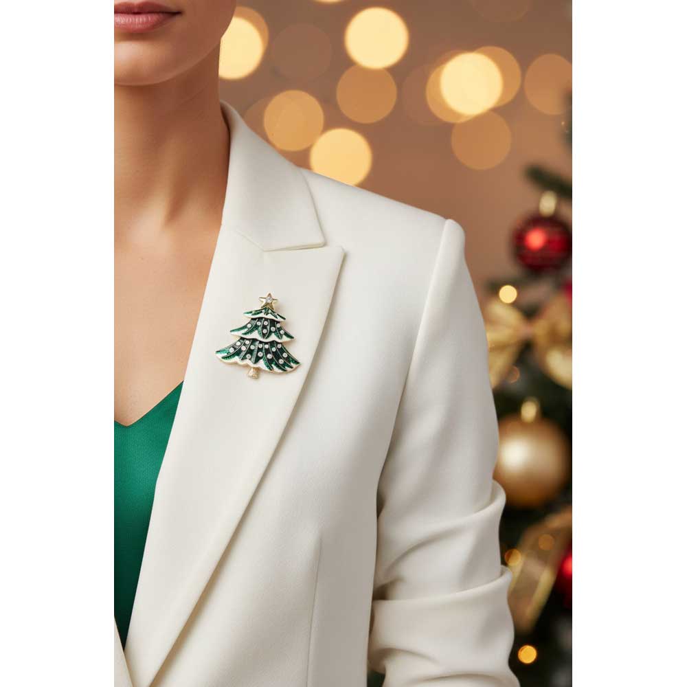 Model wearing green and white Christmas tree pin on a white jacket with a green top - Lilylin Designs