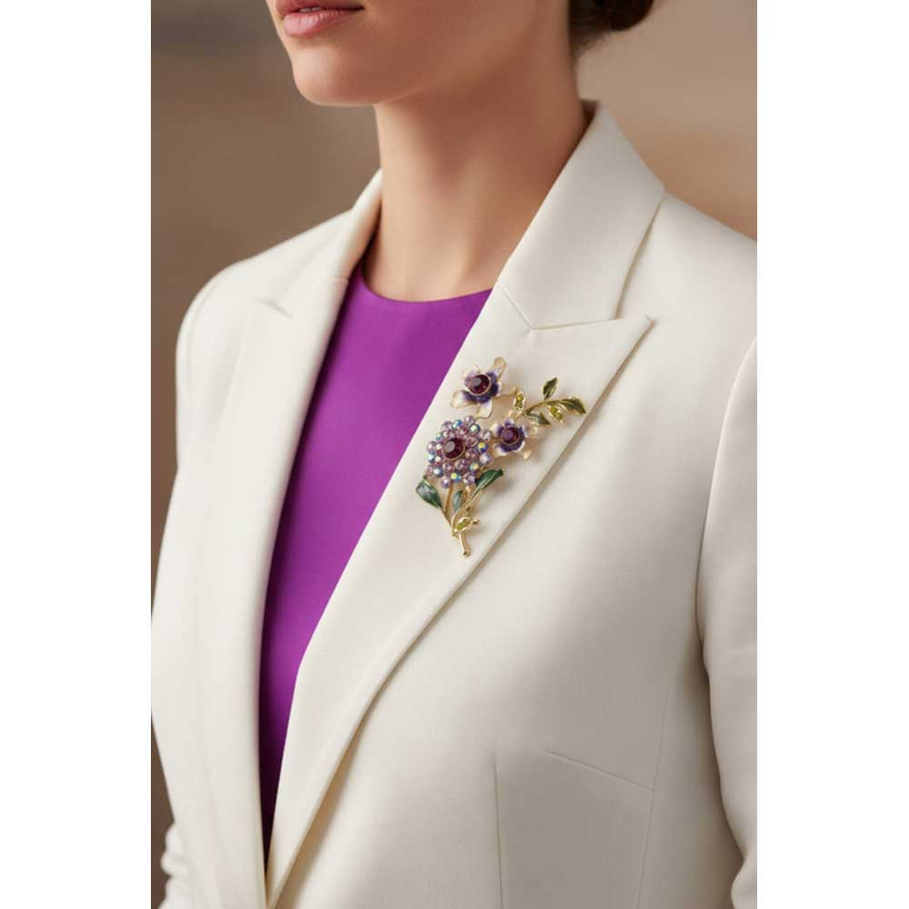 Model wearing Cream and purple crystal flower brooch pin on a white jacket with a purple top - Lilylin Designs