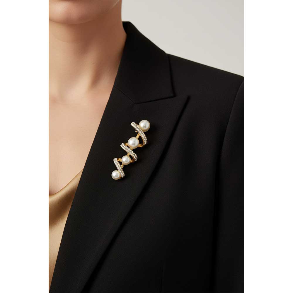 Model wearing Crystal ribbon with pearls pin on a black jacket - Lilylin Designs