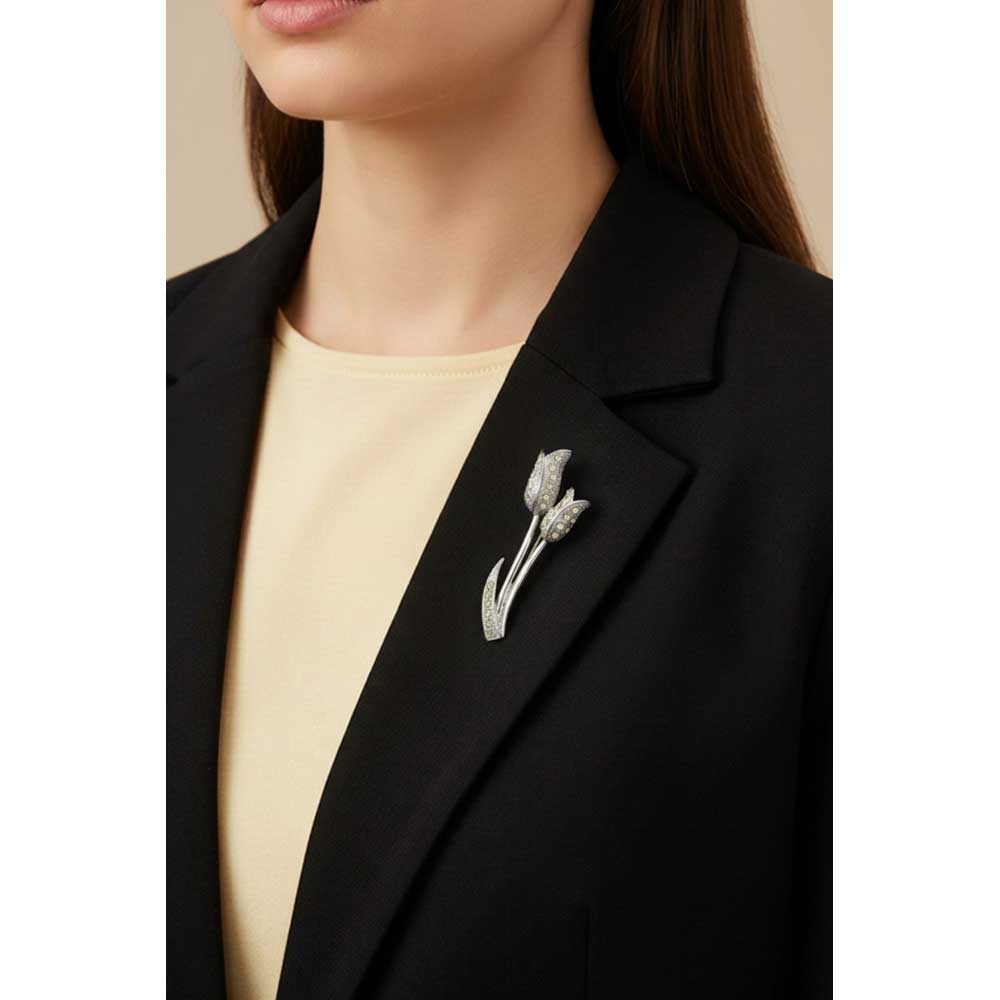 Model wearing Crystal tulips brooch pin on a black jacket with a light yellow top - Lilylin Designs