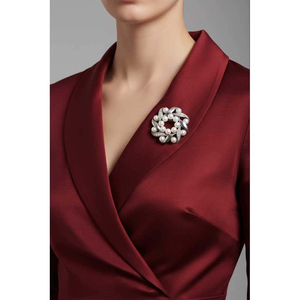 Model wearing Crystal wreath with pearls brooch pin on a red dress - Lilylin Designs