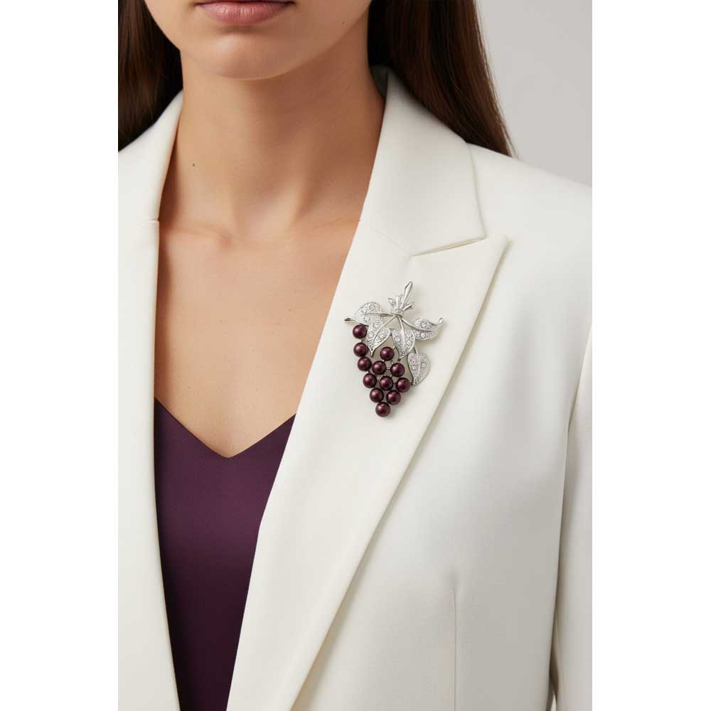 Model wearing Dark purple pearl grapes brooch pin on a white jacket - Lilylin Designs