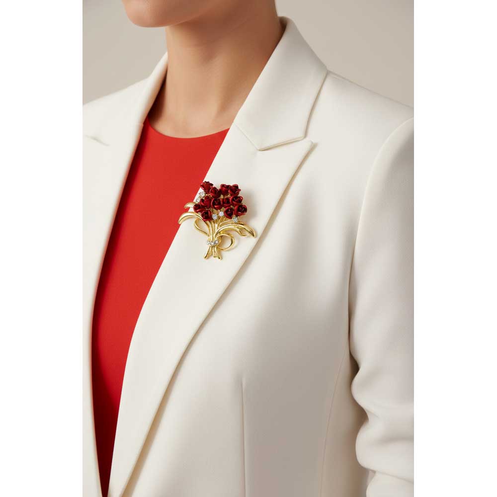 Model wearing Dozen red roses brooch pin on a white jacket with a red top - Lilylin Designs