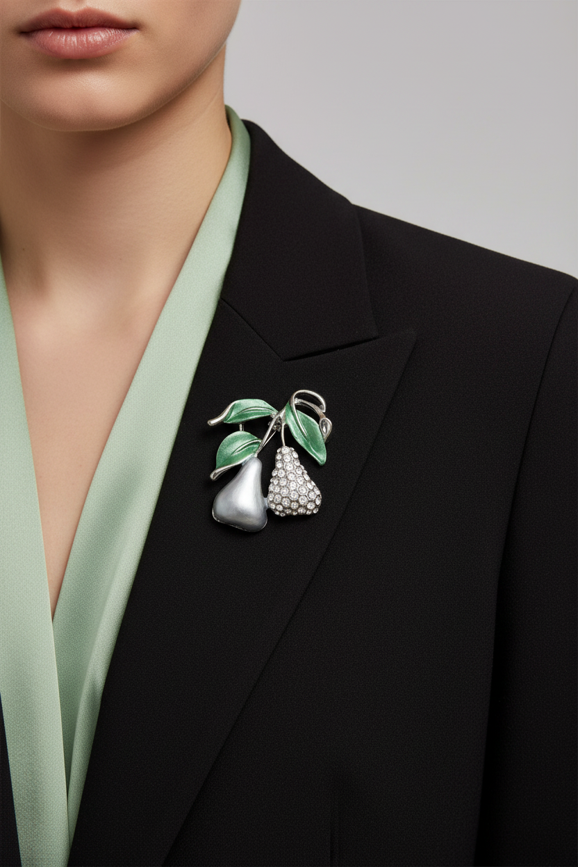 Model wearing enamel and crystal pear brooch pin on a black jacket - Lilylin Designs