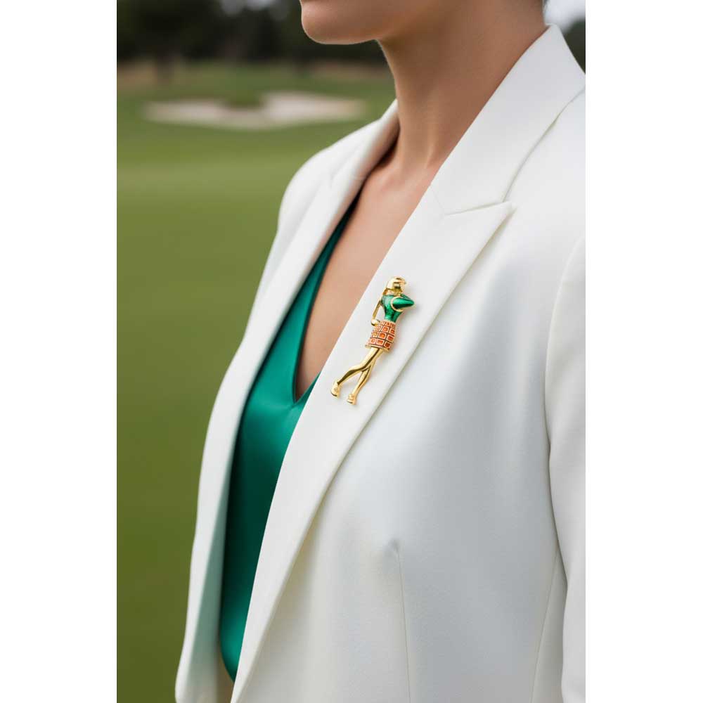 Model wearing Female golfer brooch pin on a white jacket with a green top on a golf green - Lilylin Designs