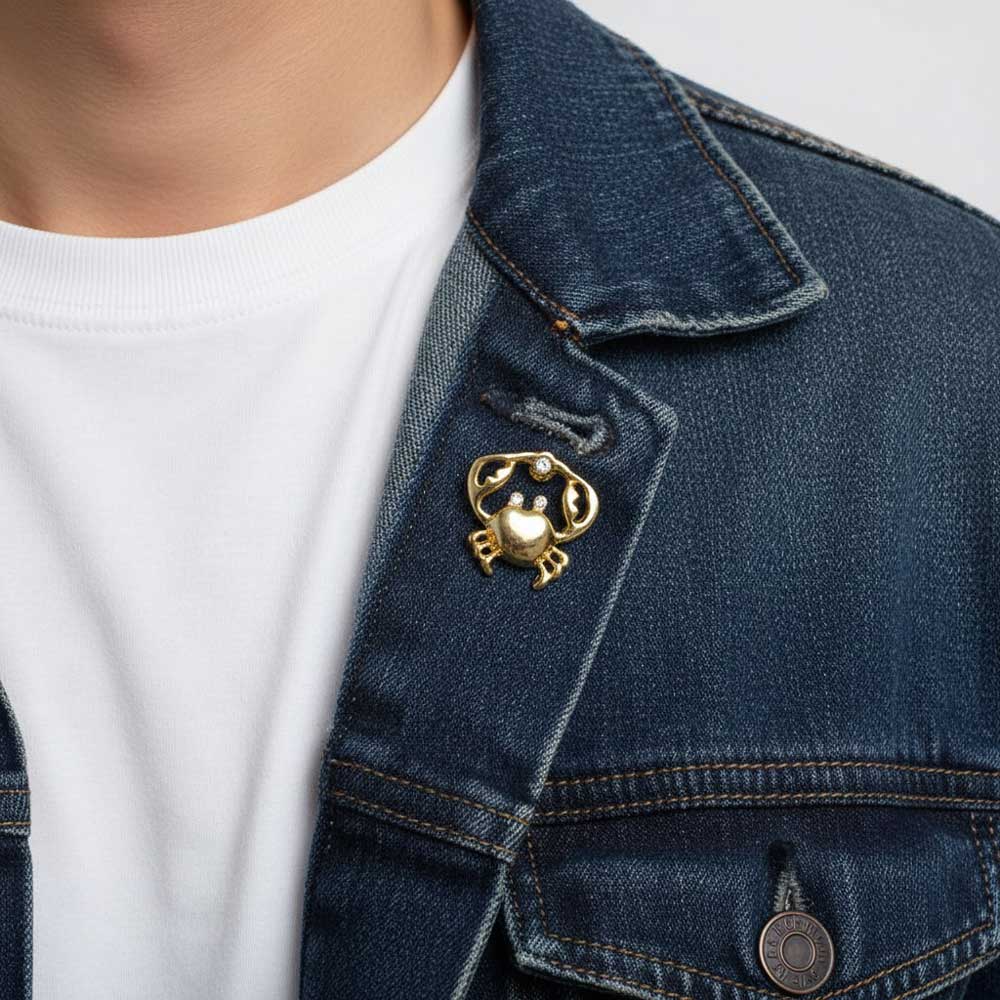Model wearing Gold crab lapel tac pin on a blue denim jacket - Lilylin Designs