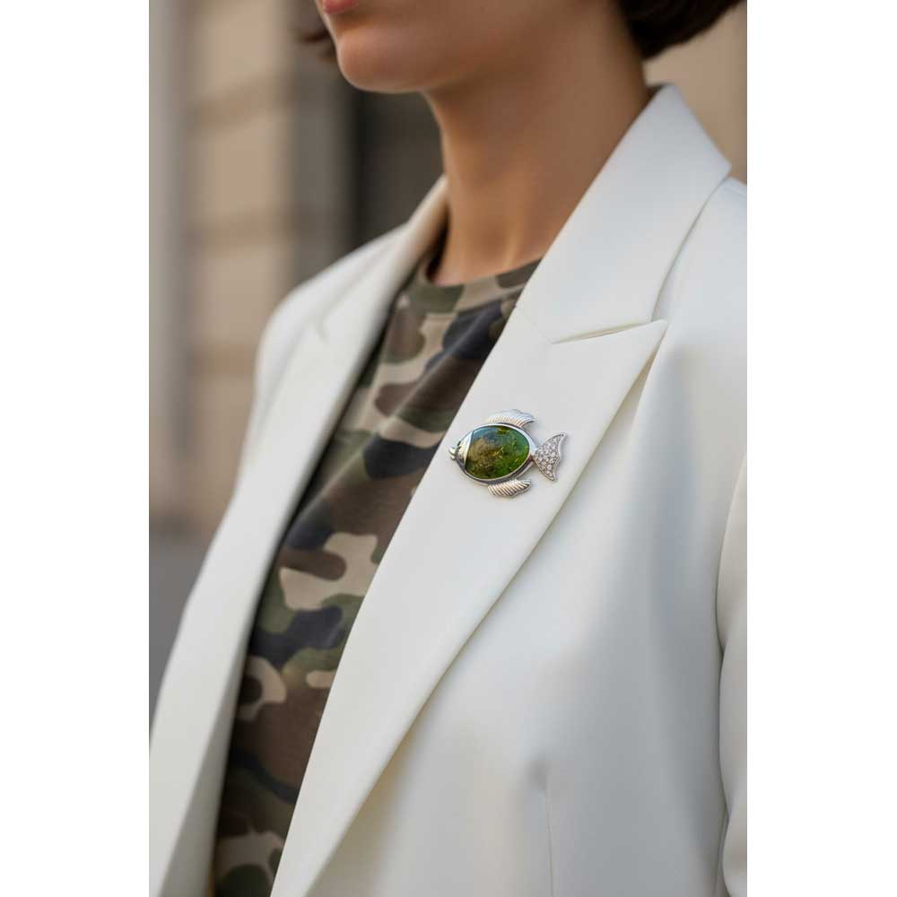 Model wearing Green fish brooch pin on a white jacket with a camouflage shirt - Lilylin Designs