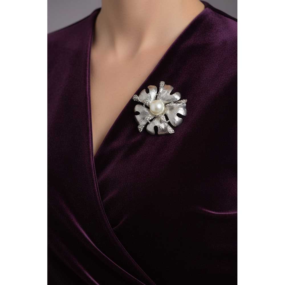 Model wearing Large silver flower with pearl brooch pin on a dark purple velvet dress - Lilylin Designs