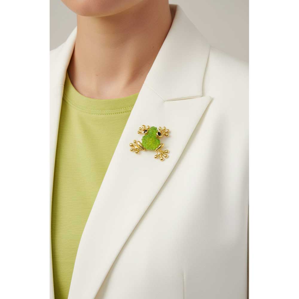 Model wearing Light green frog lapel tac pin on a white jacket with a green t-shirt - Lilylin Designs