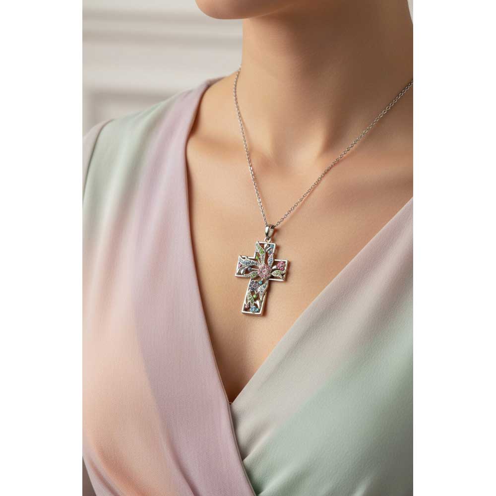Model wearing large Pastel floral cross necklace with a pastel top - Lilylin Designs